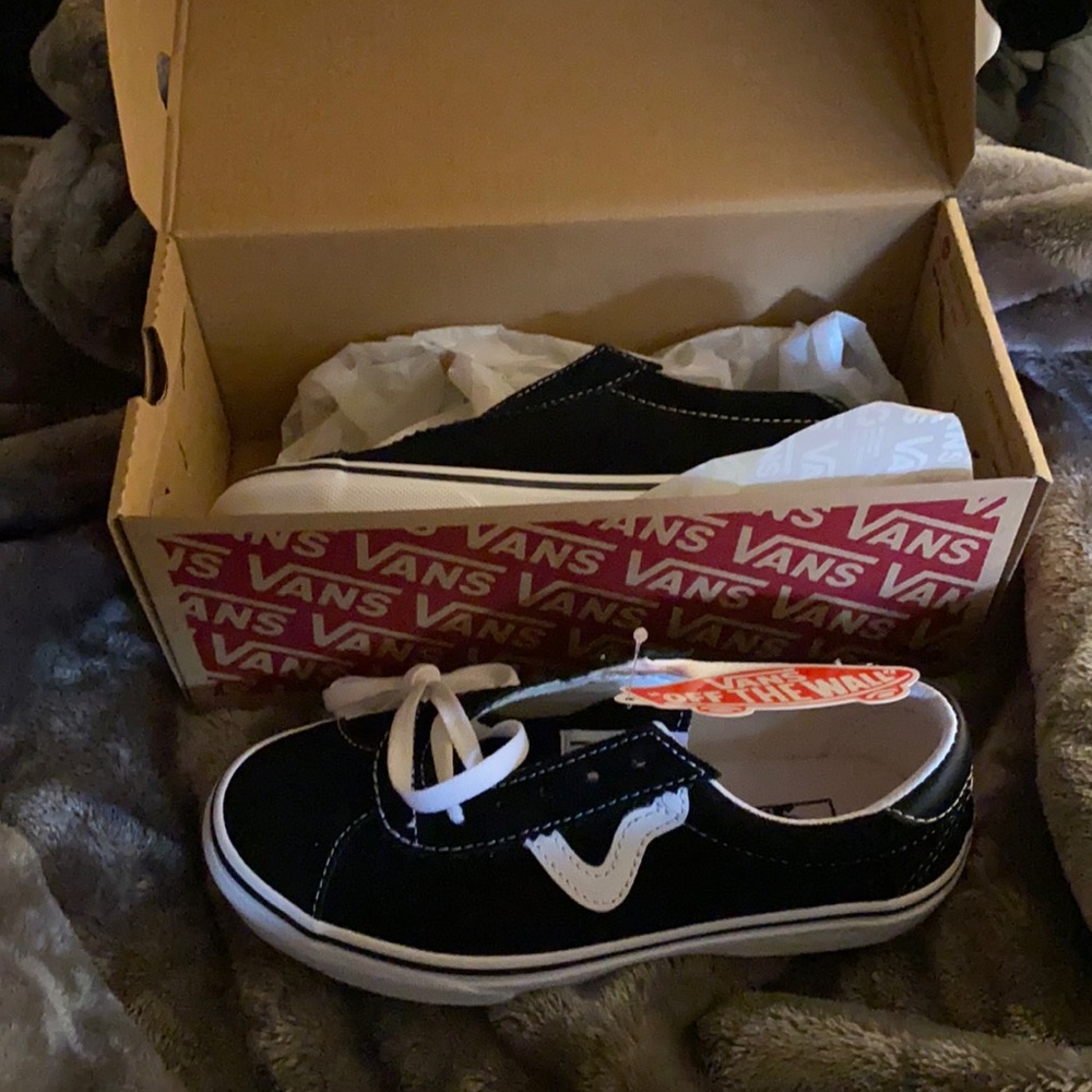 A pair of kids size 2 Vans